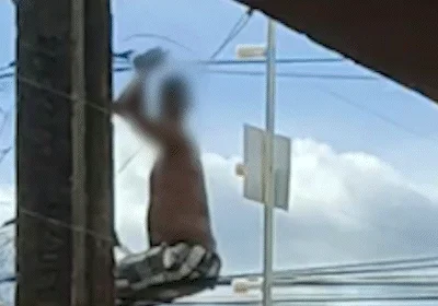 Homem é flagrado pendurado em fios para furtar energia