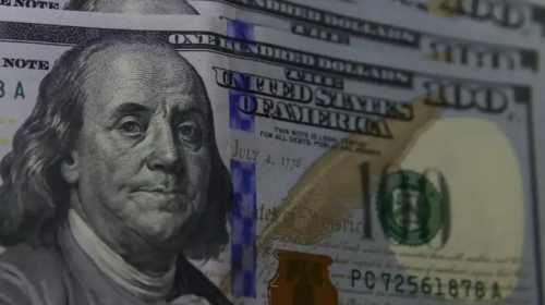 Dólar cai a R$ 4,98 com tensão externa e bolsa fecha em baixa